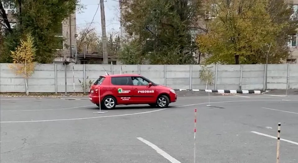 Behind the wheel, after taking his driving licence
